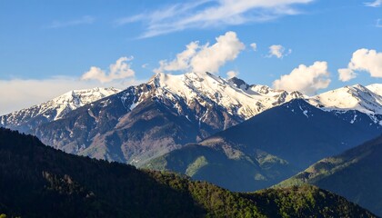 Majestic mountain range under a blue sky