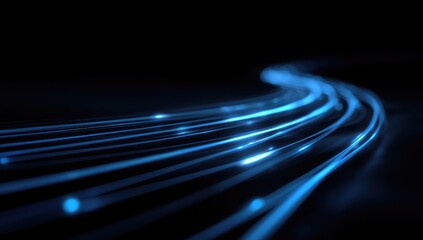 Abstract, glowing blue light trails curving across a dark background