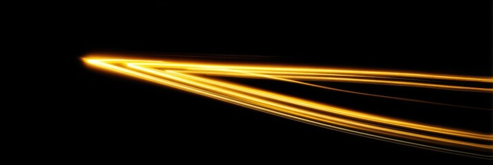 Abstract golden light streaks against a black background (1)