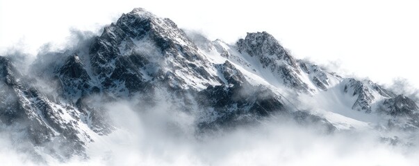 Snowy mountain peaks shrouded in mist