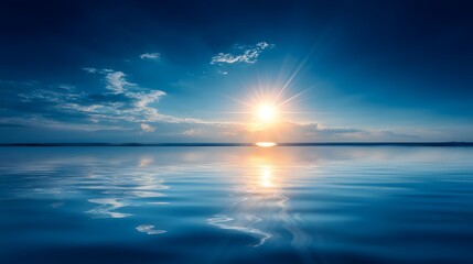 Calm sunset over a still body of water.