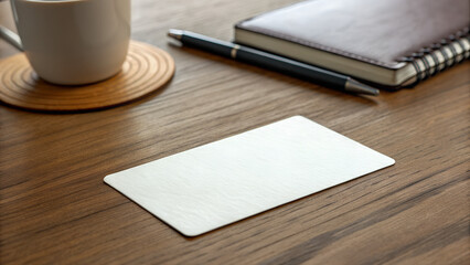 Blank business card on wooden desk with coffee cup and notebook  