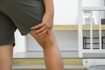 Sudden hamstring pain while walking upstairs—possible muscle or tendon strain. Ideal for ads on...