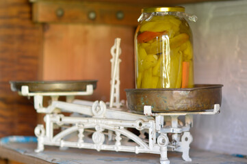 old vintage kitchen scales with glass jar and quince