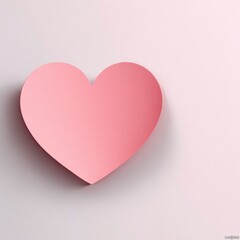 Soft pink heart shape on light background