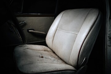 Faded interior seat of vintage car