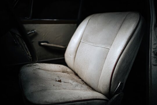 Fototapeta Faded interior seat of vintage car