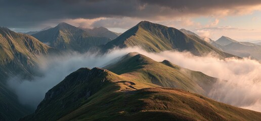 Misty mountain range at sunrise