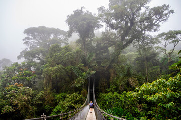 Girl on a suspension bridge in Costa Rica