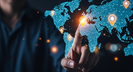 Businessman's hand touching a glowing digital world map projection. This visual represents futuristic concepts of globalization, networking, strategic planning, and expanding business worldwide.