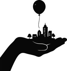 Silhouette of city skyline held in hand
