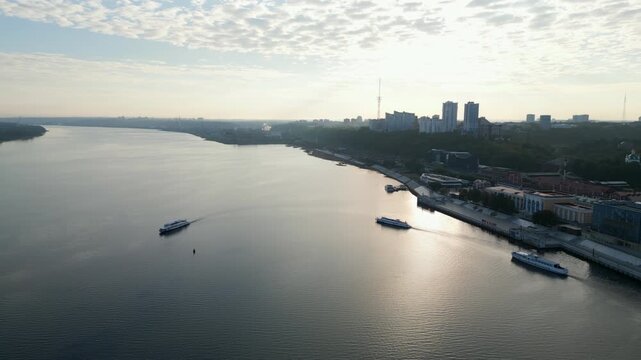 Passenger ferry moving on dnipro river at sunrise near samara city. Clip