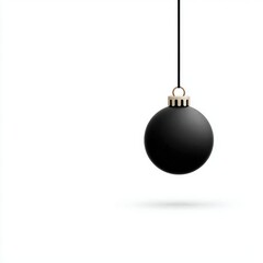 Minimalist black hanging bauble on white background, perfect for festive and modern design projects.