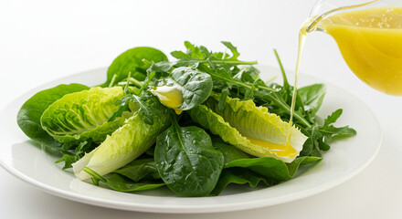 Obraz premium fresh salad being drizzled with dressing