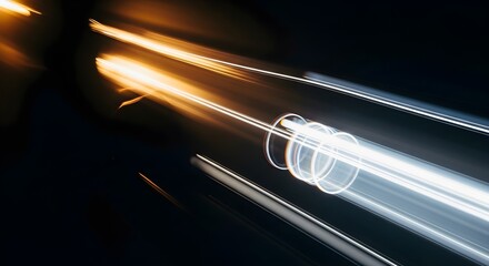 Streaking bright lights across a dark background abstract motion blur glowing lines
