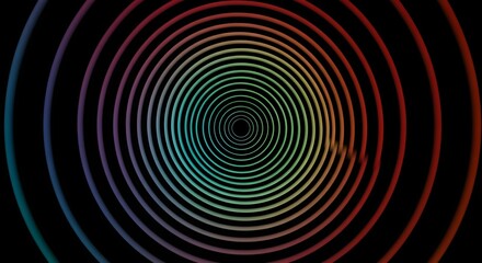 Concentric circles with a rainbow gradient against a black background abstract