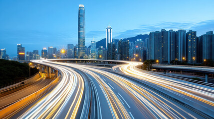 Obraz premium City skyline at dusk with light trails from moving vehicles on elevated road