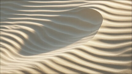 Sandy dune with rhythmic wave patterns lit by the sun