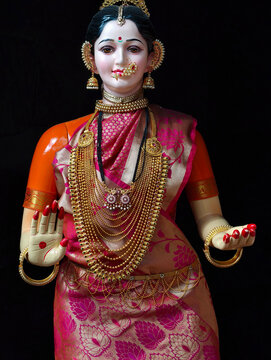 11 August 2025, Pune, Maharashtra, India, Faces of Goddess Gauri mother of ganesha For sale And Worshiped During Ganesh Festival in Pune.