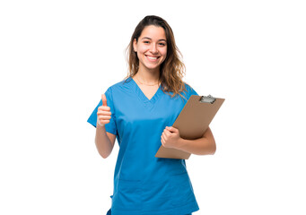 Smiling young woman nurse holding clipboard and giving thumbs up on transparent background, PNG