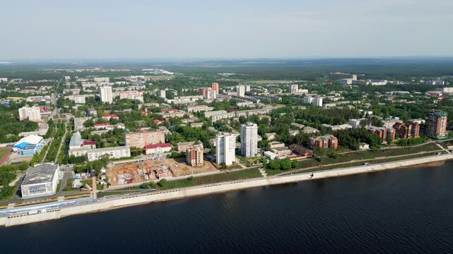 Seversk cityscape embracing the tom river in summer. Clip