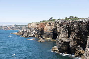 coastal cliffs and sea caves at Boca do Inferno in Cascais, Portugal