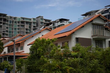 old houses in the city, solar panels on the roof of a house in Singapore