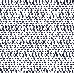 A mottled texture or screentone of closely spaced dots.