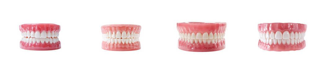 Obraz premium Four realistic dental prosthetics displayed against a black background, cut out transparent