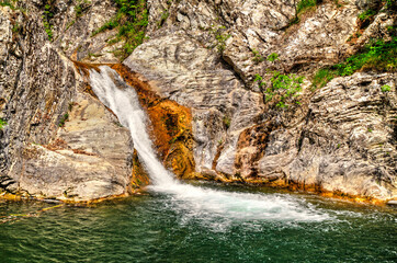 Beautiful landscape with waterfall in the mountain