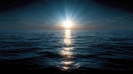 Sunrise over a dark sea.  Vast ocean,  horizon line.  Bright sunburst,  starry night sky
