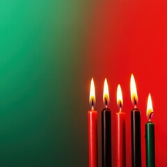 Kwanzaa candles on red to green gradient background