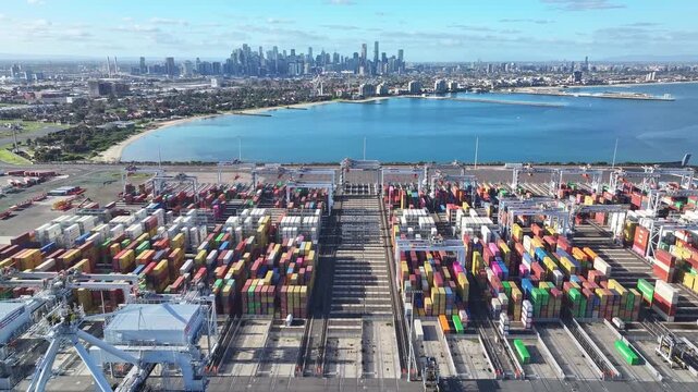 Melbourne container port with city skyline in background