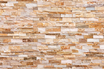 Natural Stone texture background. Beige brown color. Square rectangle shape in horizontal row stripe. Material for architectural decoration, wall cladding panel for facade, hotel, pool villa, resort.