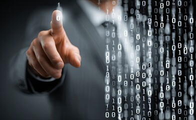 Businessperson's finger points at digital binary code