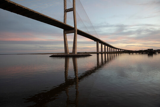 A reflection of Sidney Lanier bridge at sunset