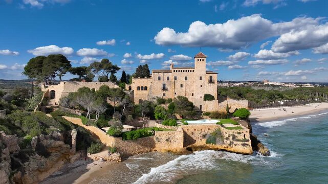 Aerial view of Tamarit Castle on Costa Daurada in Spain, near Tarragona, Costa Dorada, Catalonia. Historic Tamarit castle on Costa Dorada Meditarrenian coast, Spain