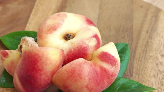 Fresh peaches on a wooden background. Flat peach donut shape