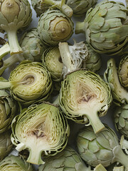 Obraz premium Artful display of prepped artichokes ready for culinary transformation.