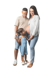 Happy pregnant woman with husband and adorable 3-year-old son in denim overalls, all wearing jeans...