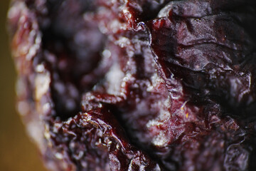 Macro texture of fresh cherry turn dehydrates after two month in the fridge