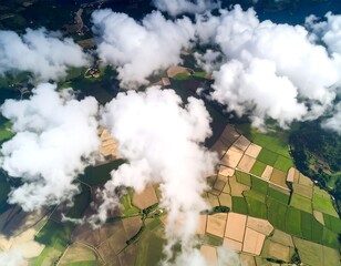 Aerial view of agricultural fields and clouds