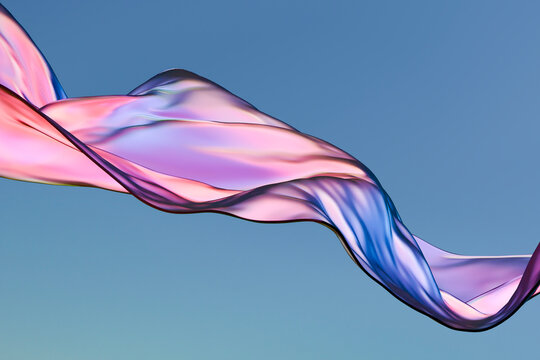 Flowing colorful cloth against a clear sky
