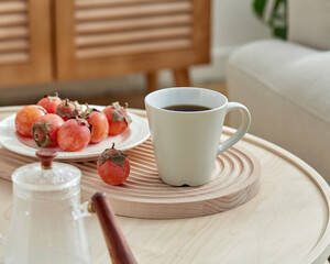 Serene Morning Coffee Break A Cozy Lifestyle Scene with Coffee, Fruit, and Wooden Tray, Cup of...