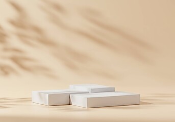 Rectangular podiums with dappled sunlight on a wall.

