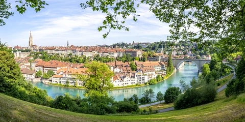 Bern city on the river Aare old town with church Berner Munster panorama in Switzerland © Markus Mainka