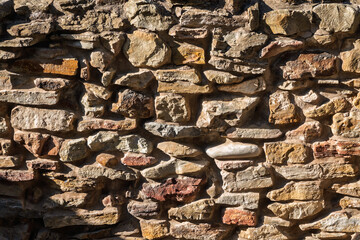 Backgrounds of the old stone wall.