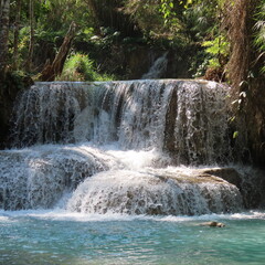 romantic turquoise water, small waterfall in the jungle
