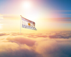 Argentina national flag aerial view clouds in beautiful sky. Top view. Drone. Aerial bird's eye fly...