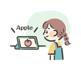 A girl learning English using a tablet